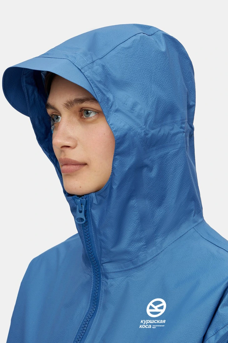 Model wearing a jacket with the Curonian Spit logo